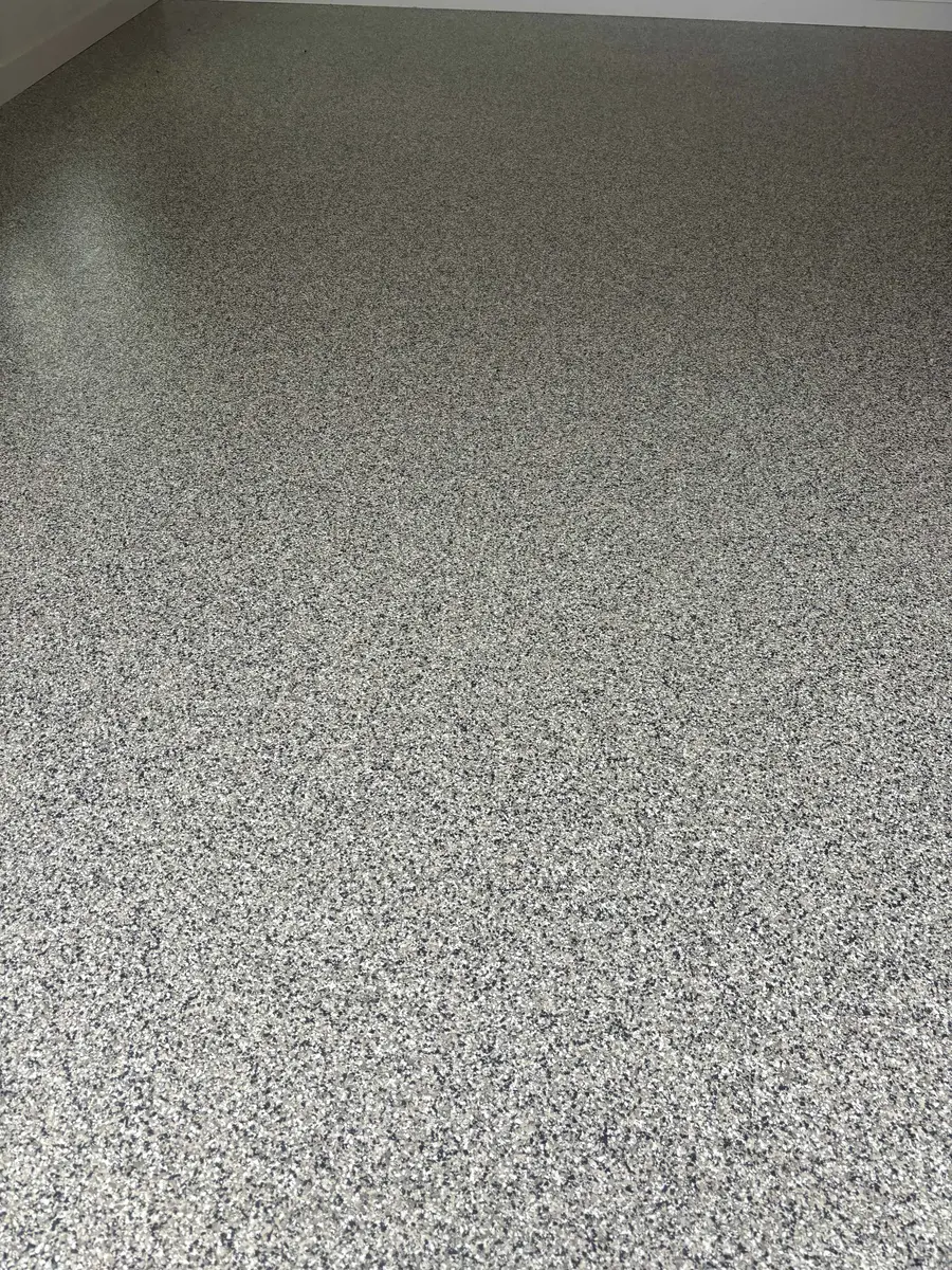 Actual speckled epoxy floor from Restore's project photos
